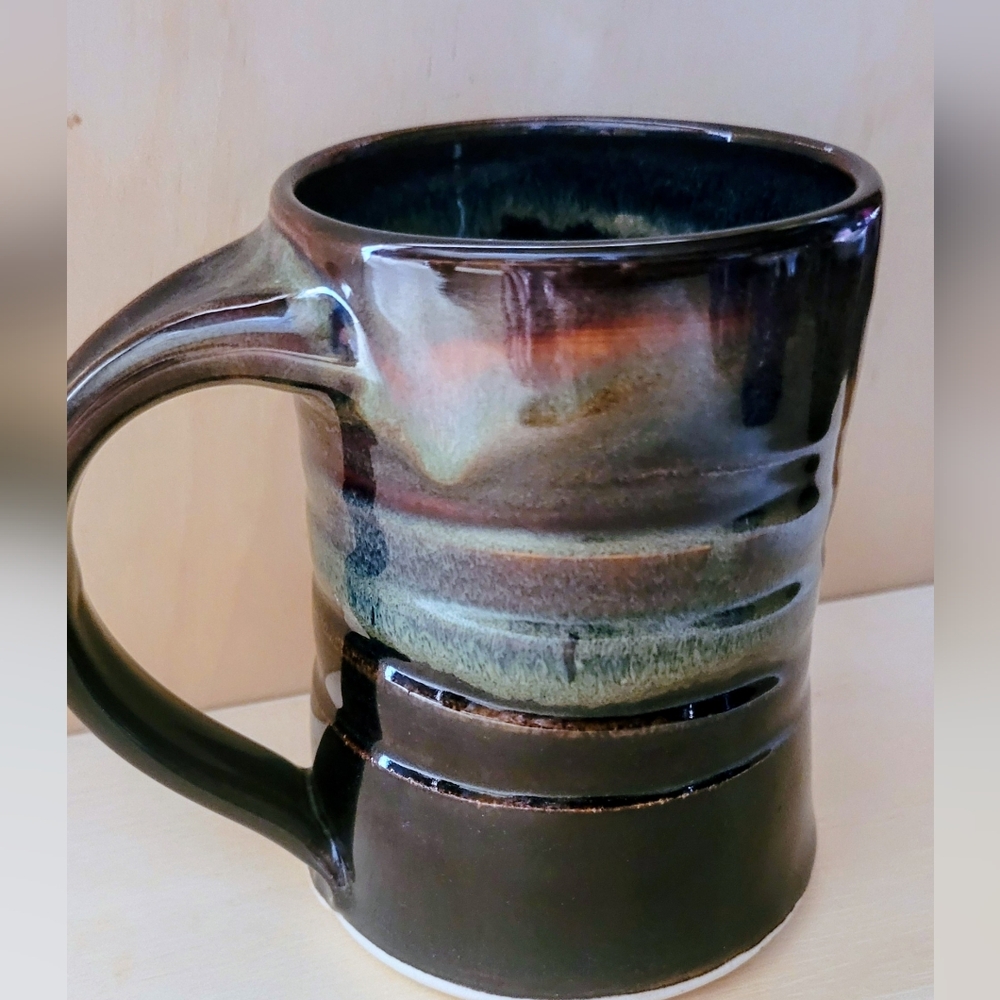 Handcrafted Ceramic Mug with Earthy Tones